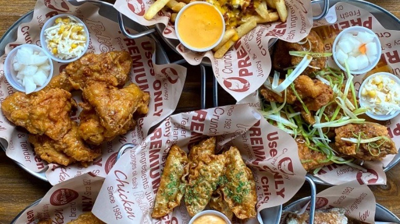 a spread of Pelicana fried chicken and fries