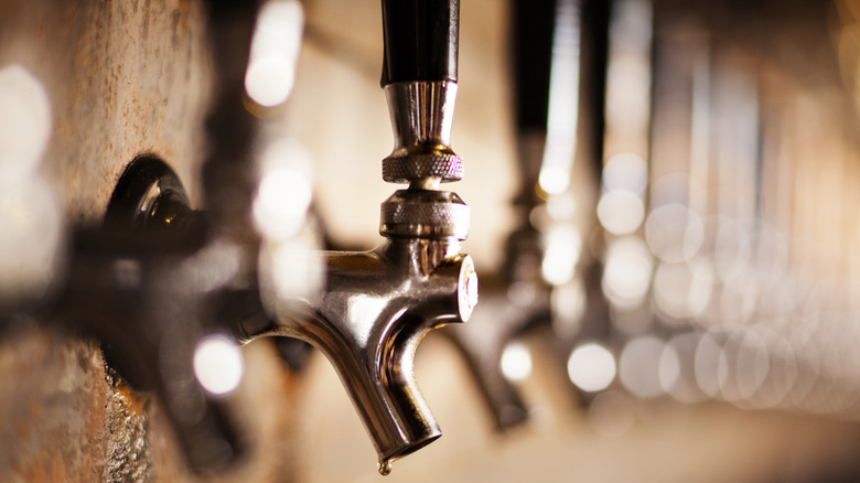 Long line of beer taps