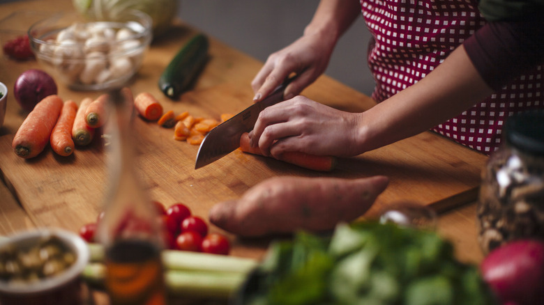 Woman chopping vegetables 