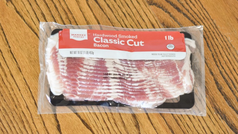 A package of Market Pantry hardwood smoked classic cut bacon