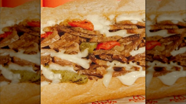 A close up of an Arby's roast beef cheesesteak sandwich