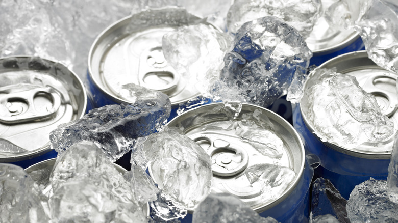 Soda cans in ice