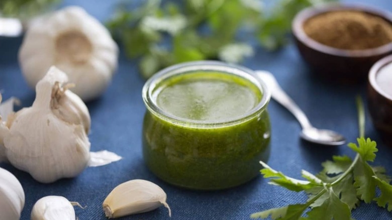 Green marinade and garlic bulbs