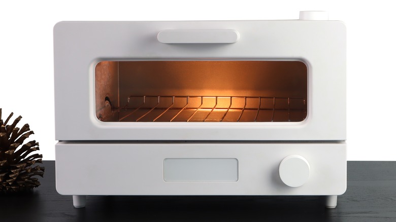 A white toaster oven on a counter