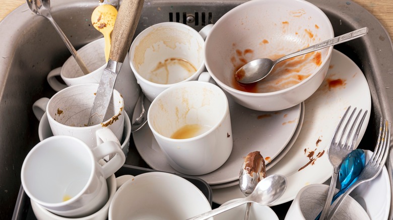 Sink full of dirty dishes