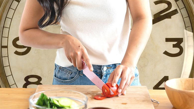 Woman cutting veggies background clock