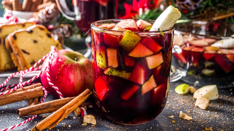 Mug of fruity colorful mulled wine