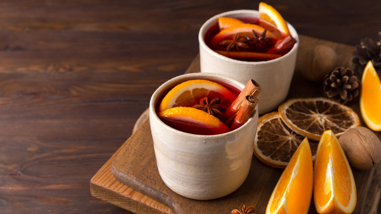 Mulled wine on wooden cutting board