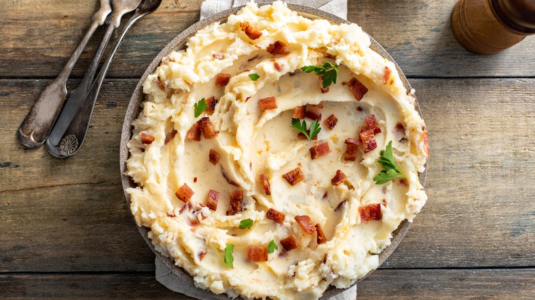 Mashed potato with bacon and herbs