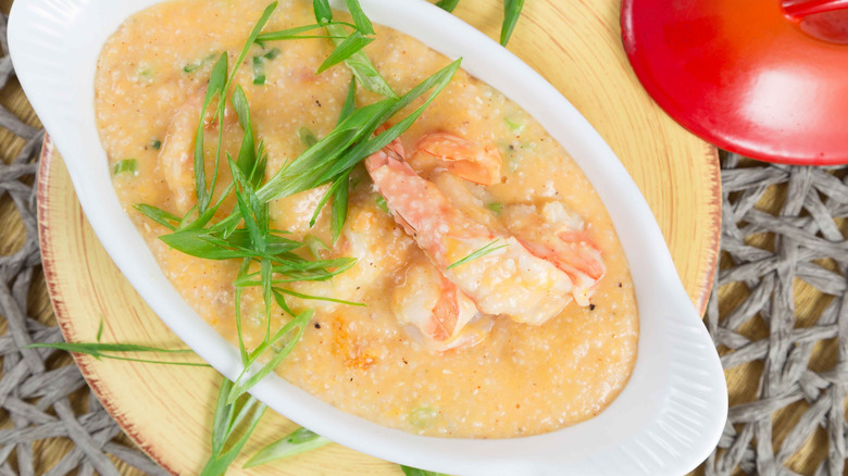 An overhead shot shows shrimp and cheese grits.