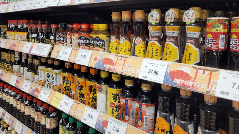 array of sauces in supermarket