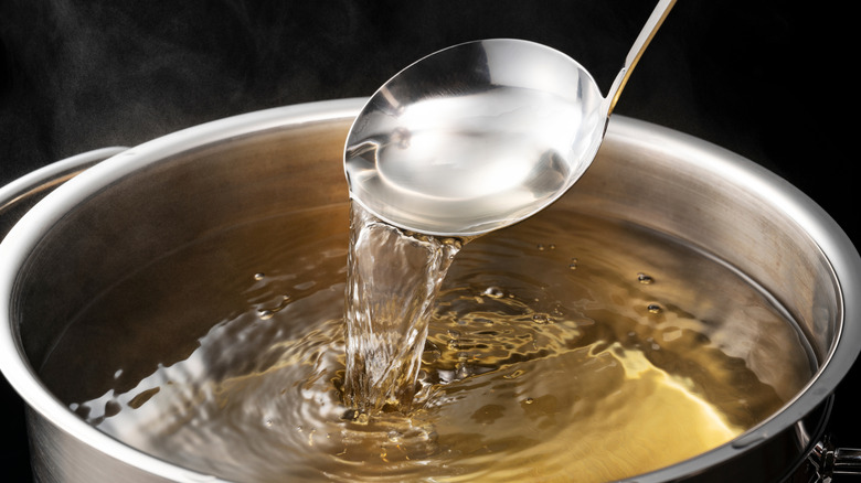 Dashi broth in pan