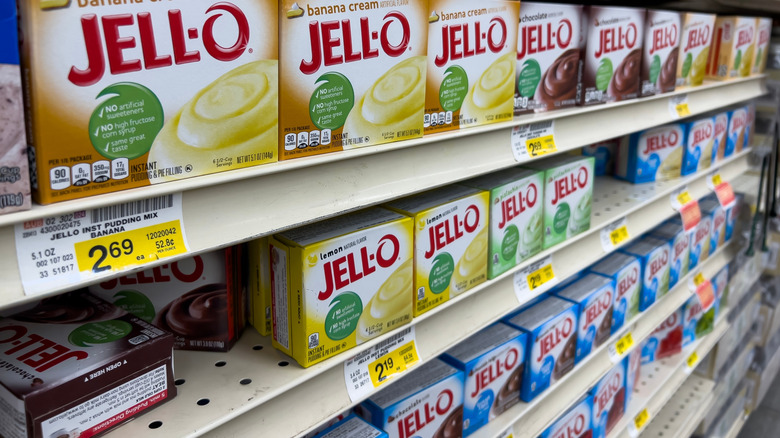 rows of Jell-O Instant Pudding on a supermarket shelf