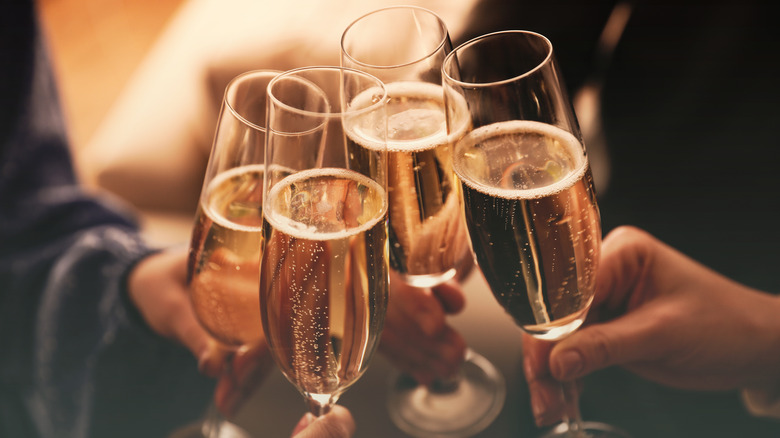 Champagne glasses toasting