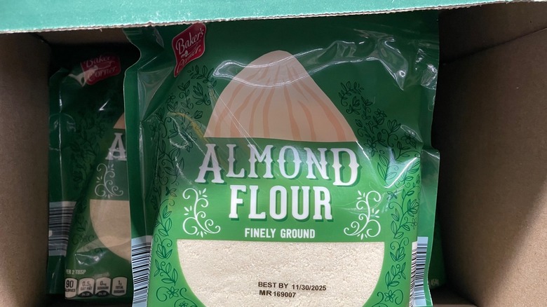 A bag of Aldi almond flour sits in a display box at the store.