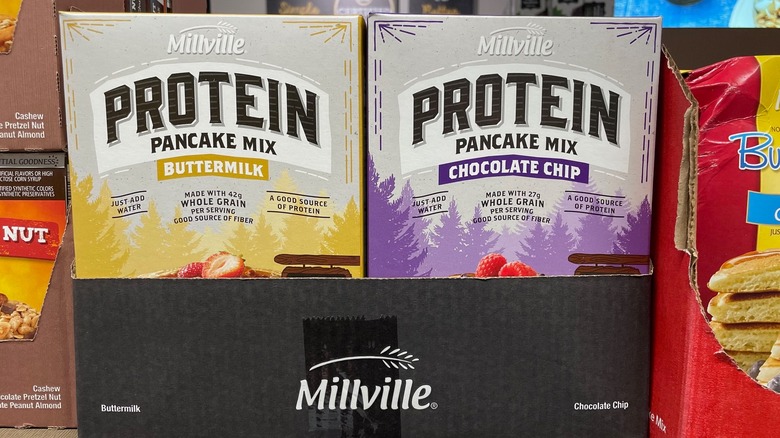 Boxes of Aldi protein pancake mix are in the display box at the store.