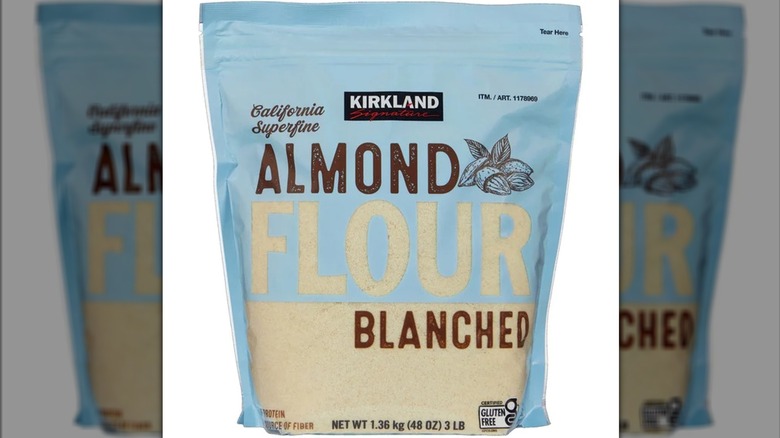 A bag of Kirkland Signature almond flour on a white background