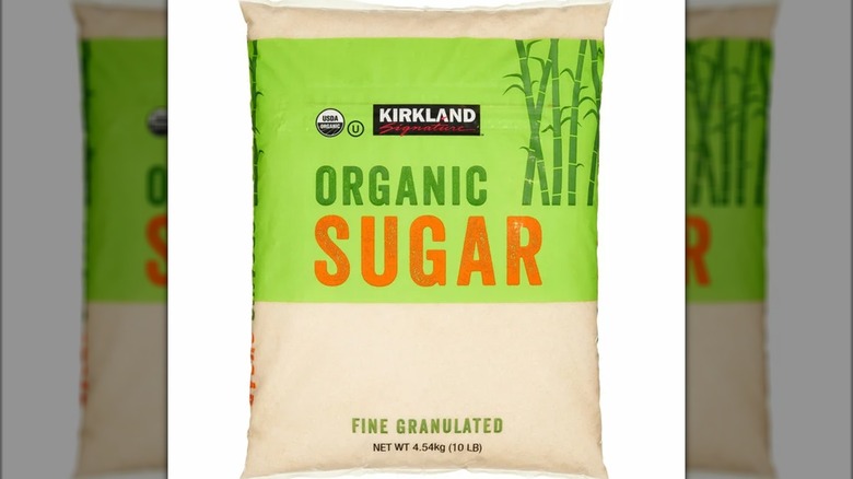 A bag of Kirkland Signature organic sugar on a white background