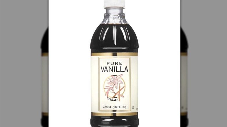 A bottle of Pure Vanilla extract on a white background