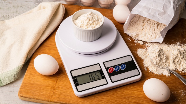 Baking ingredients with flour on a digital scale