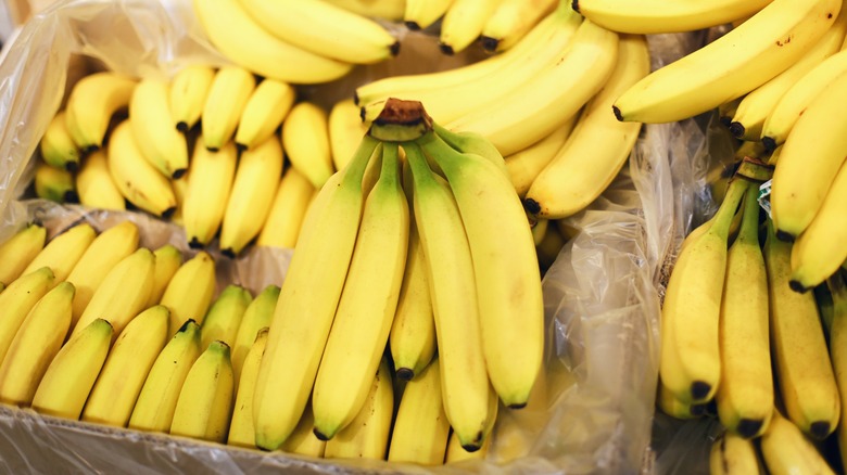 Bunches of bananas in a carton