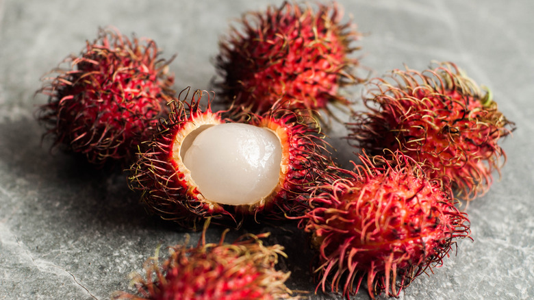 Fresh rambutan split open