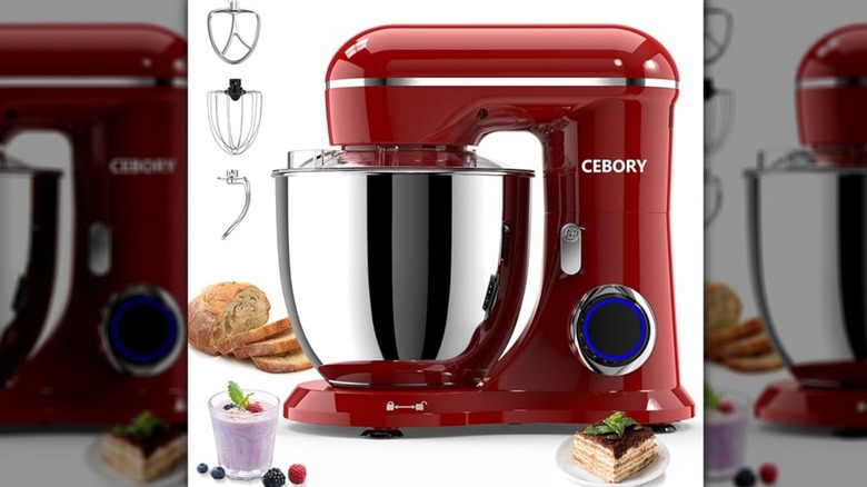 Red CEBORY mixer surrounded by attatchments and food items