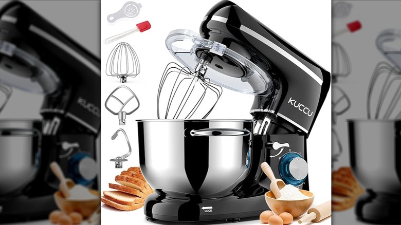 Black KUCCU stand mixer surrounded by accessories and ingredients