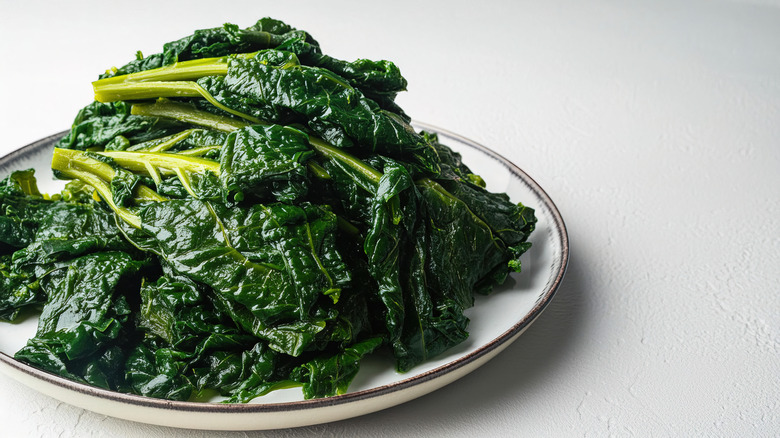 a pile of collard greens on a plate