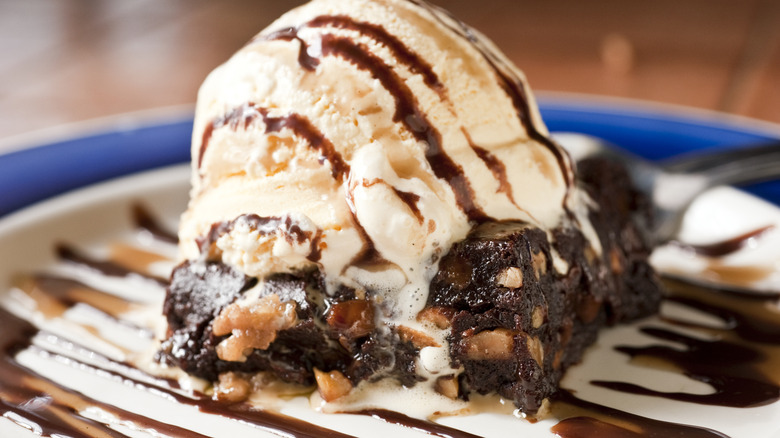 an ice cream sundae with chocolate and icing