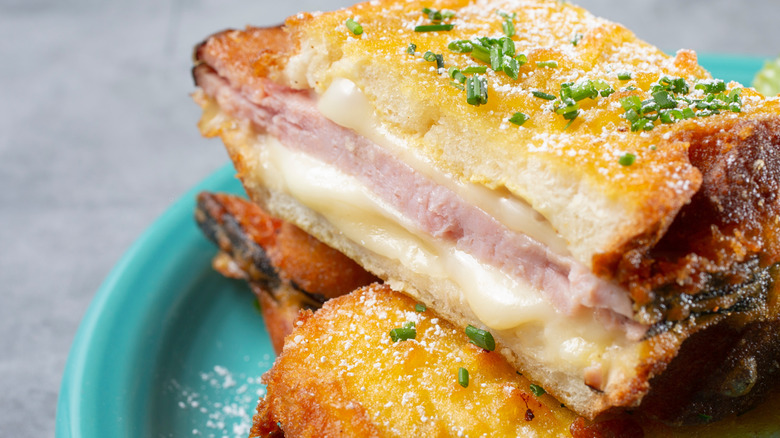 Monte cristo sandwich on blue plate