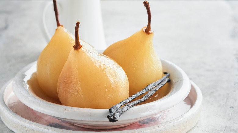 Poached pears with vanilla pod