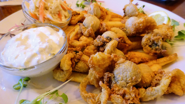 fried clams with tartar sauce and coleslaw