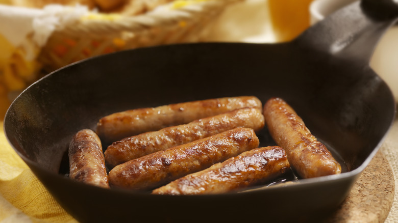 sausages in a cast iron pan