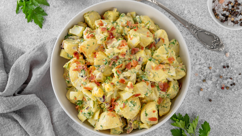 white bowl filled with potato salad