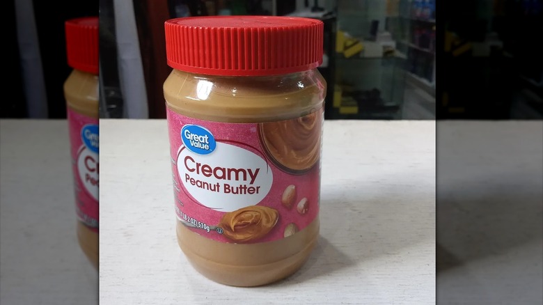 Peanut butter jar on counter