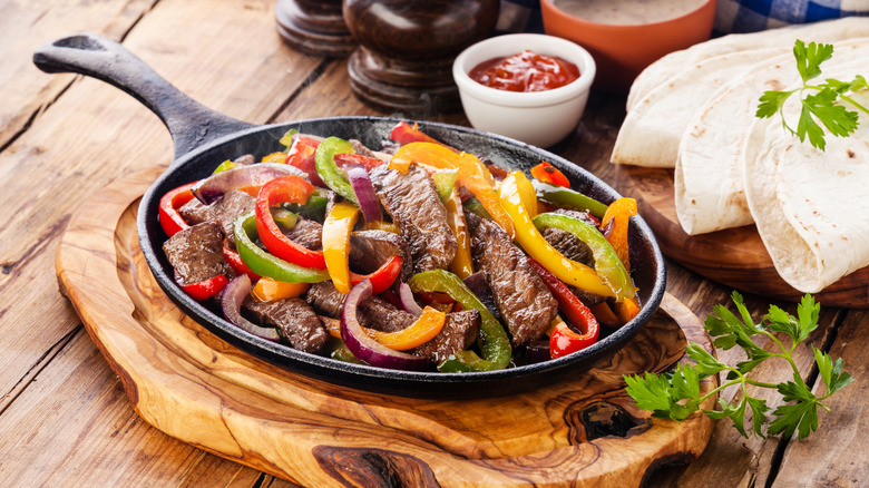 Beef fajitas in a skillet