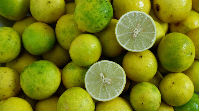 Overhead shot of whole and halves limes