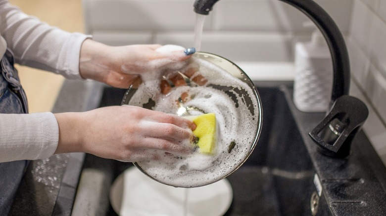 Woman washing dish