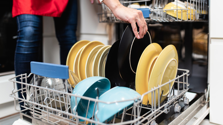Colorful dishes in dishwasher