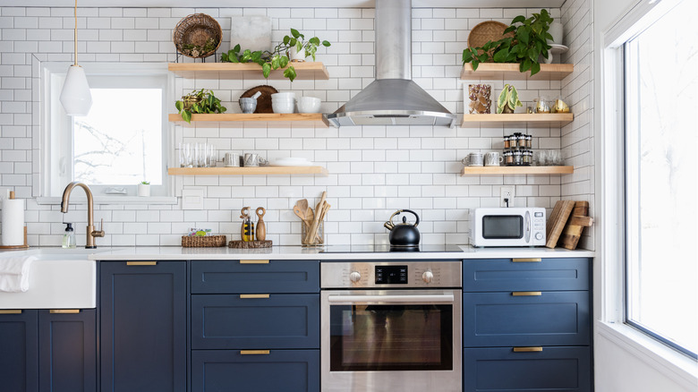 empty kitchen with blue counters