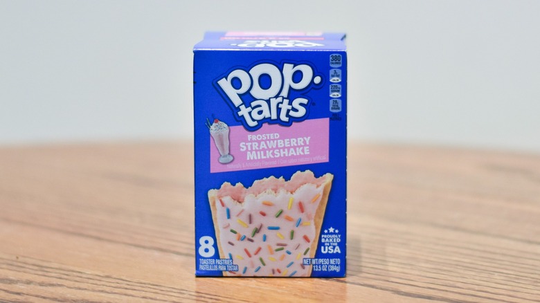 A box of Strawberry Milkshake Pop-Tarts on a wooden table