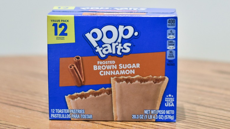 A box of Brown Sugar Cinnamon Pop Tarts on a wooden table