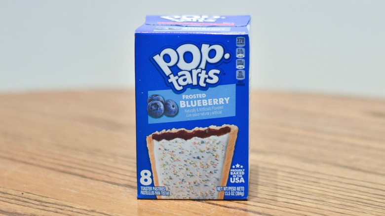 A box of Blueberry Pop Tarts on a wooden table