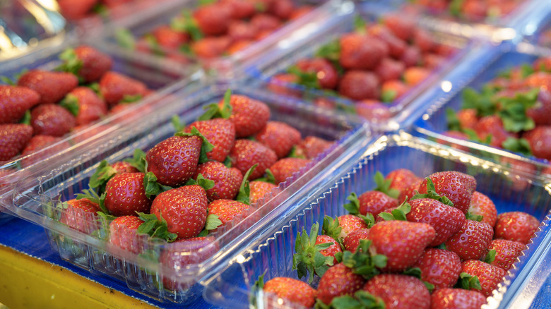 strawberries in clear plastic containers