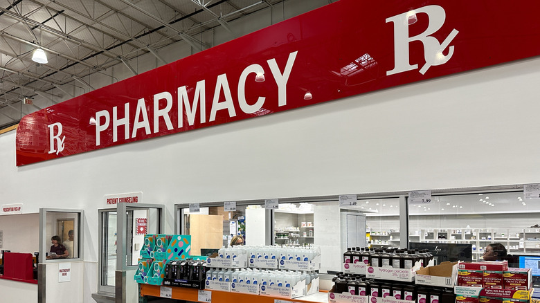 The Costco pharmacy counter with a red sign