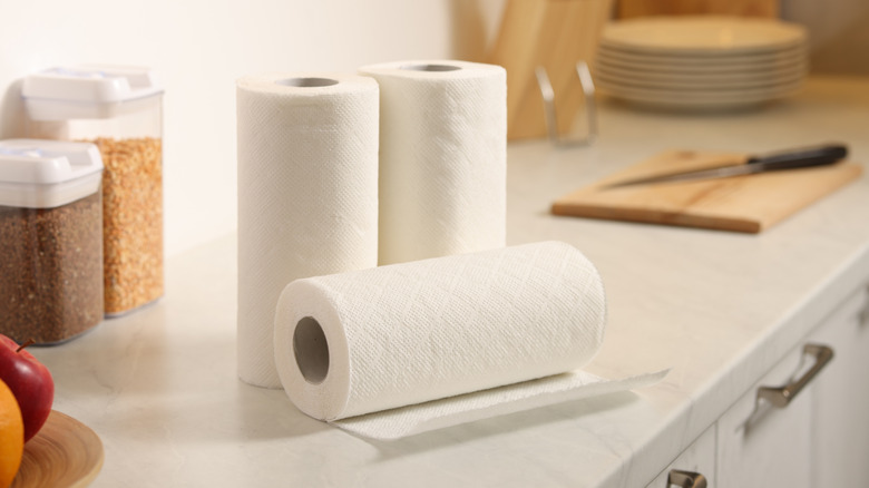 paper towel on white marble counter top