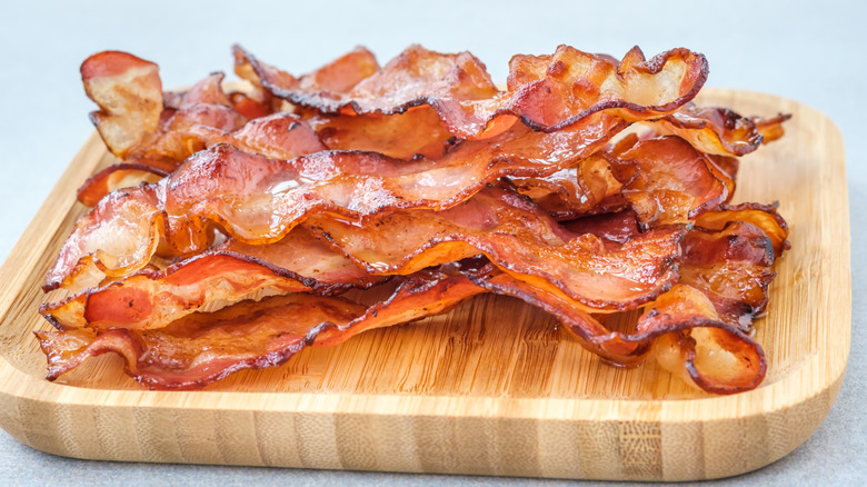 Pile of bacon on board