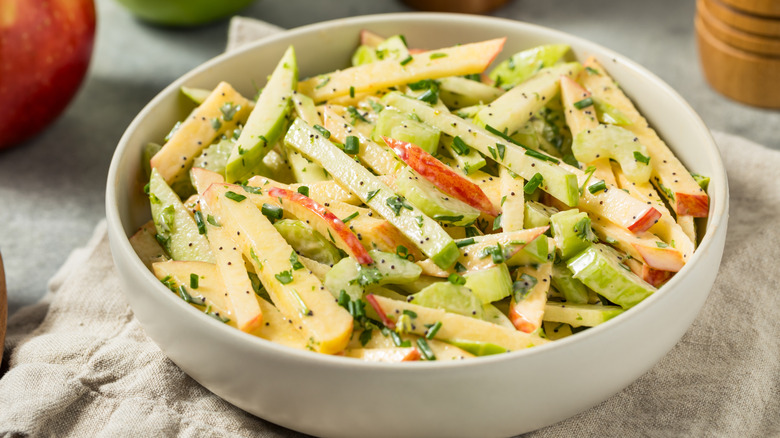 Apple slaw in white bowl