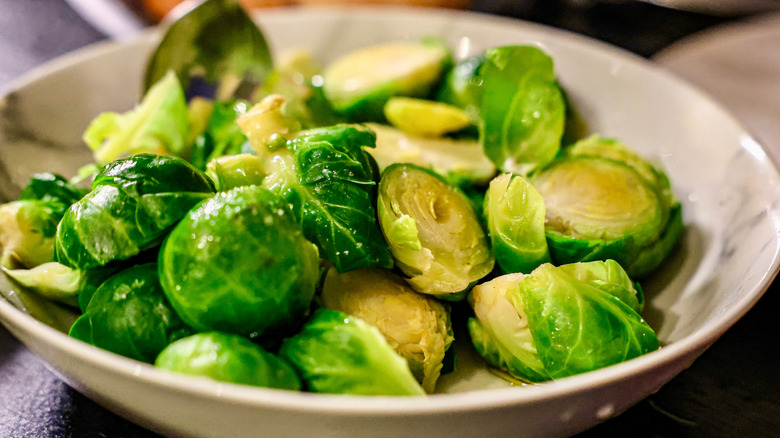 Brussels sprouts in a white bowl